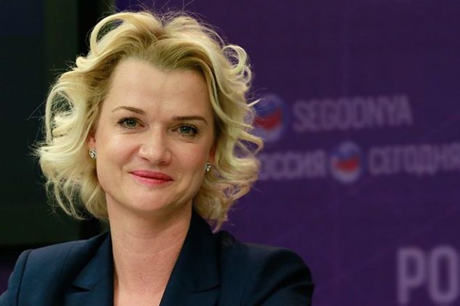 Двукратная олимпийская чемпионка в упражнениях на брусьях Светлана Хоркина